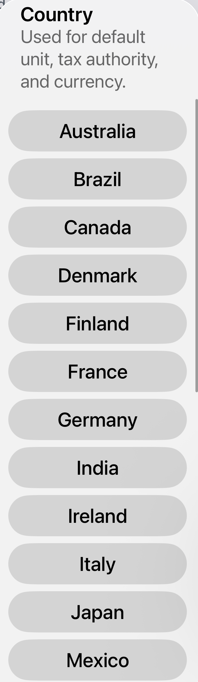 MyMilesAI country picker — 23 countries from Australia to the United States; the modal notes the choice sets default unit, tax authority, and currency